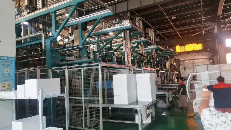 EPS shape molding production with part conveyors at Yixing packaging factory